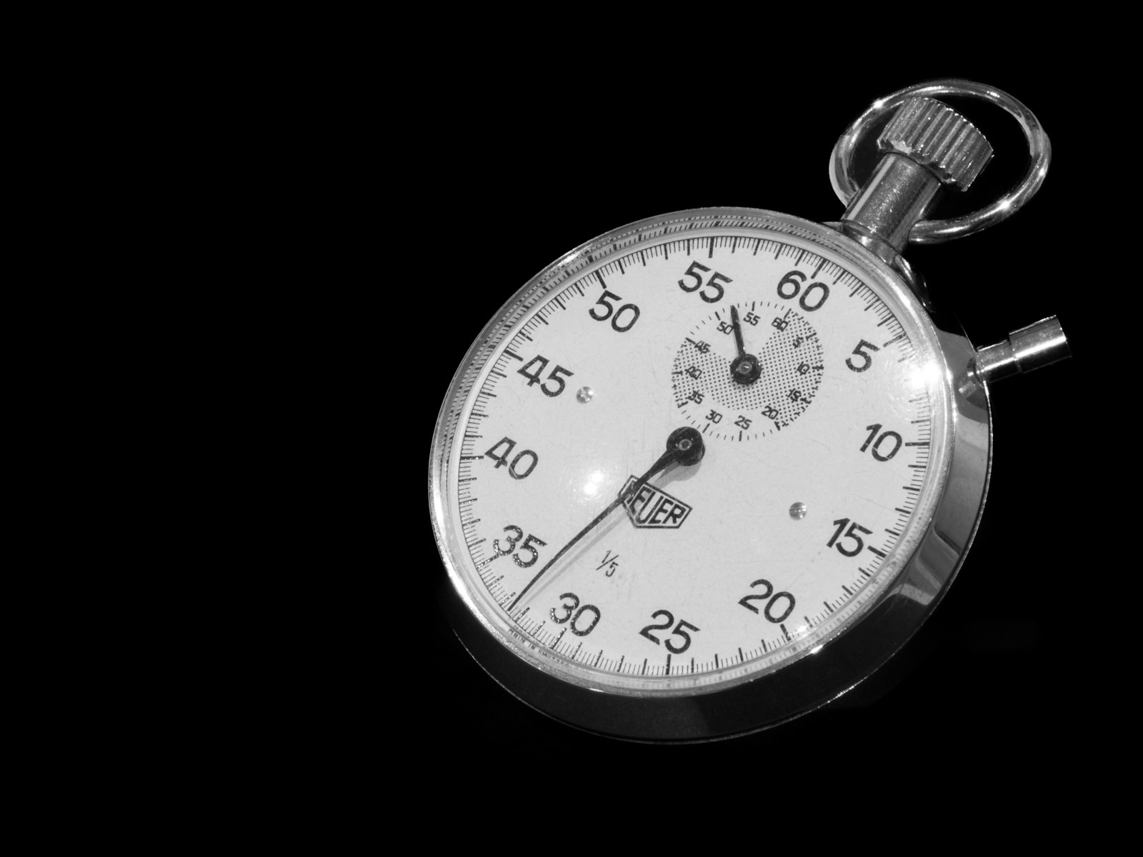 Stopwatch macro shot showing timing and precision