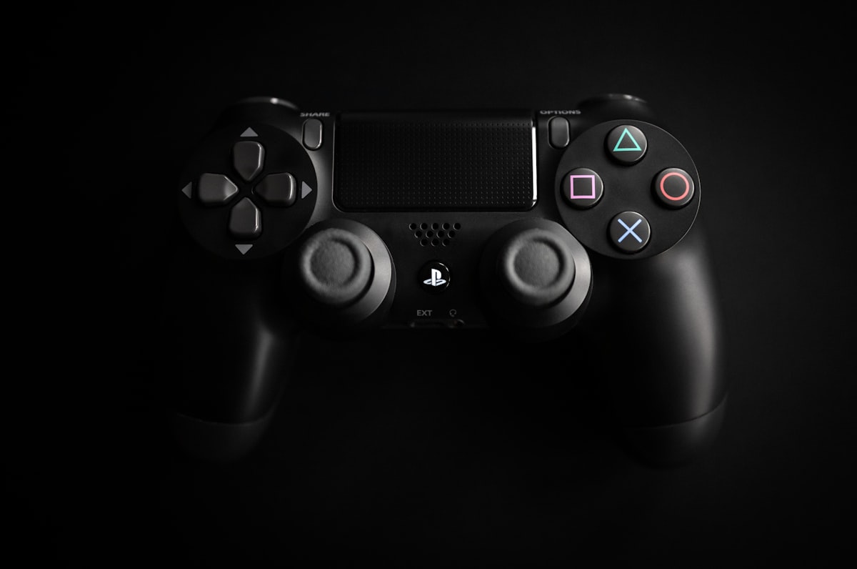 Glowing game controller lit in neon