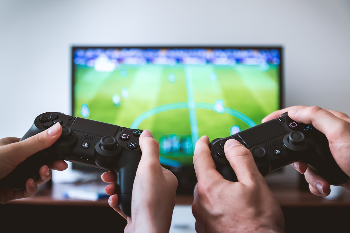 Retro game controllers on dark background